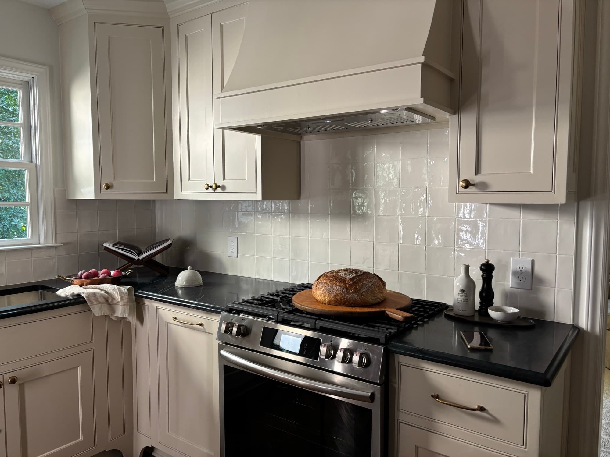 Carpenter fastening cabinetry with a drill (placeholder photo, replace with a Cooper project)